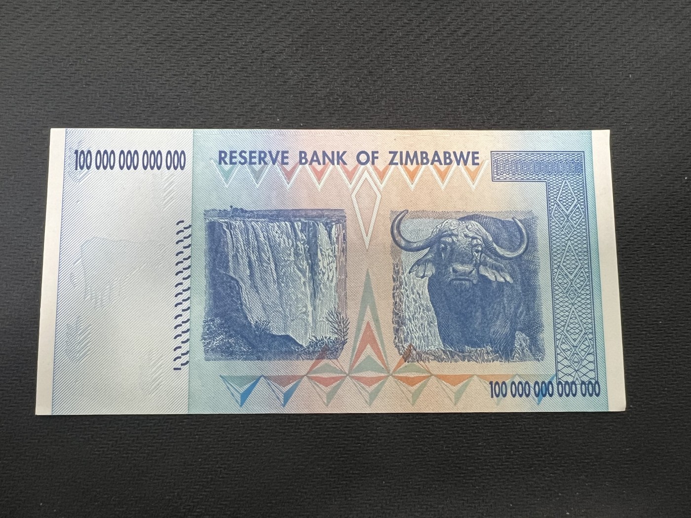 飞翔风筝第三场拍世界纸币银币硬币 津巴布韦100万亿纸币AA冠号