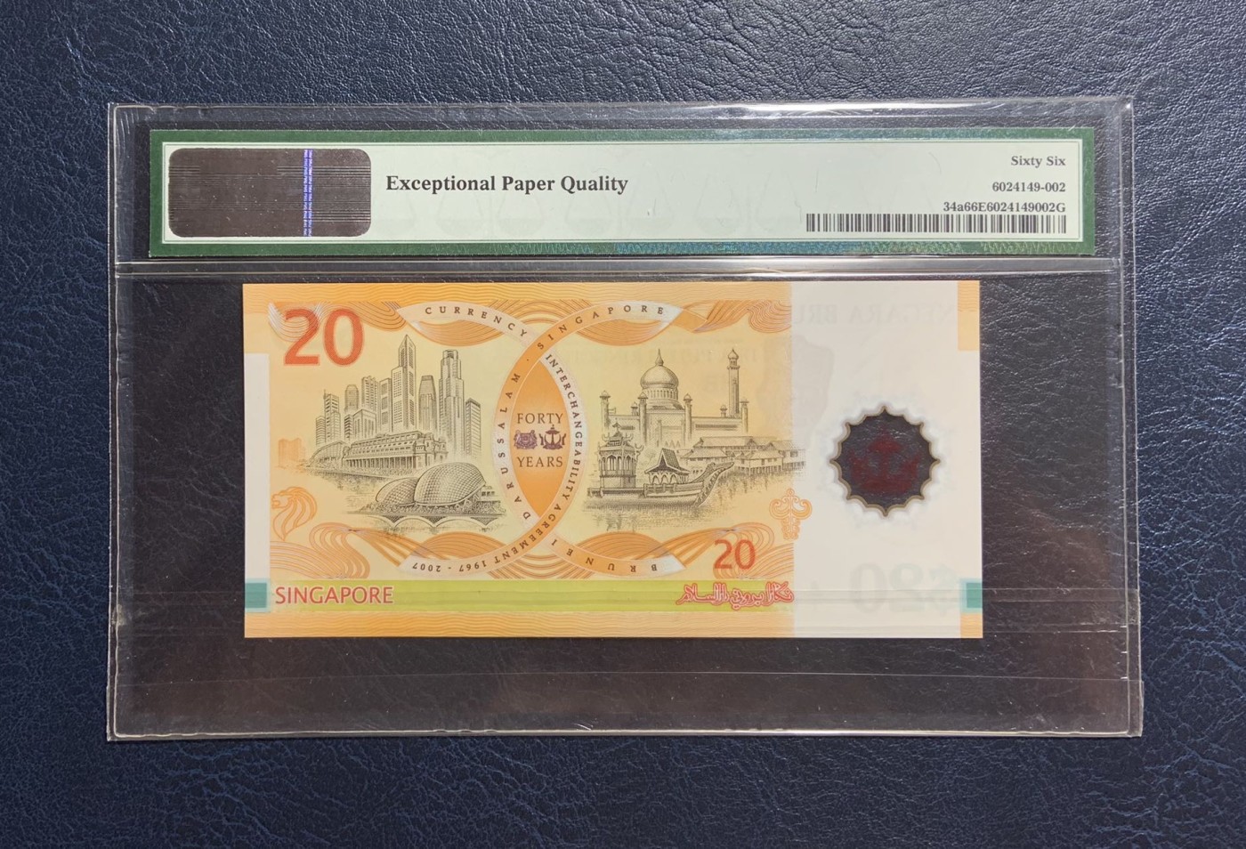 收藏联盟Quantum Auction 第271期拍卖  文莱2007年20吉令特货币等值纪念钞 PMG66 首发A/1冠 号码无47