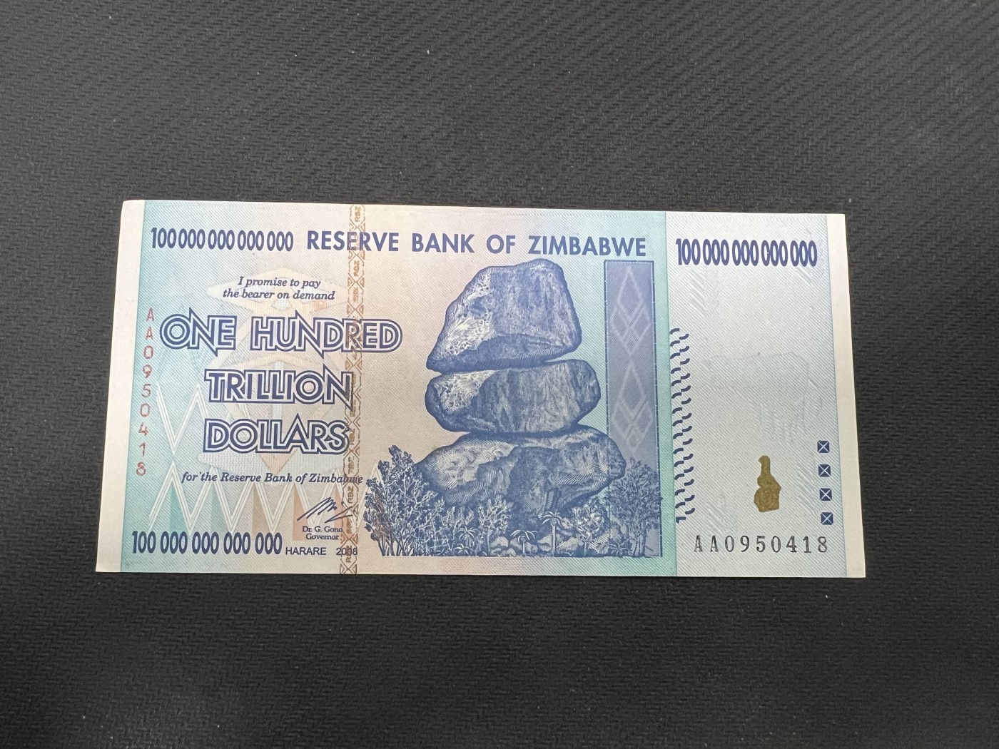 飞翔风筝第三场拍世界纸币银币硬币 津巴布韦100万亿纸币AA冠号