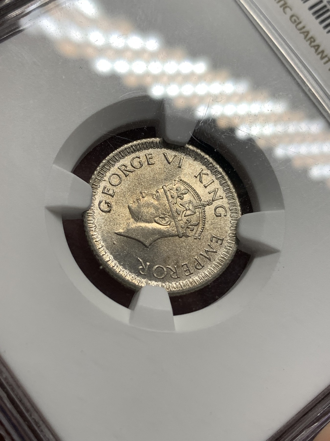 《竞宝斋》第179场-周日，周一2场 (全场包邮) NGC MS64 英属印度 乔六 1942年 1/4卢比银币 小面值少见