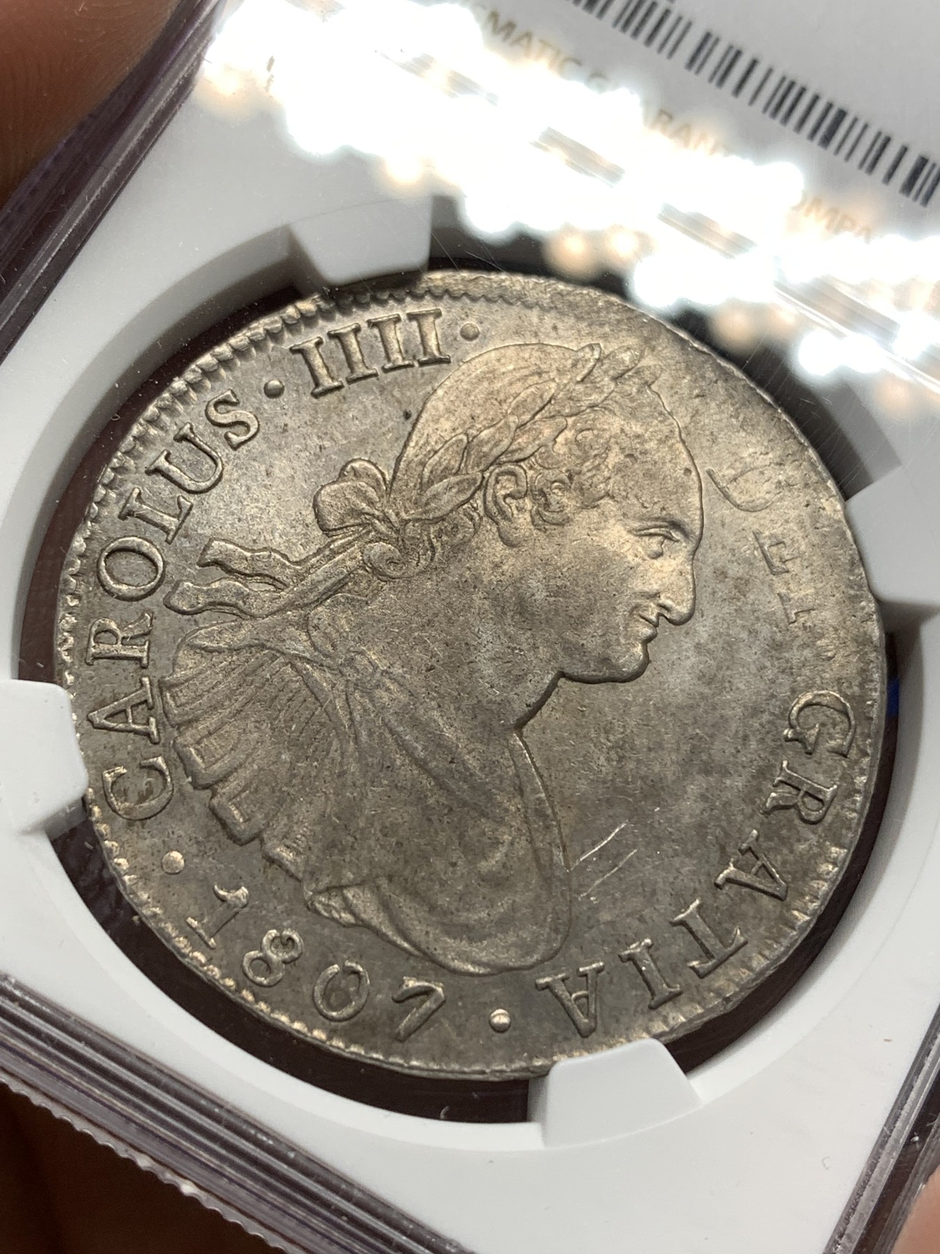 《竞宝斋》第179场-周日，周一2场 (全场包邮) NGC AU58 墨西哥 1807年 卡四 双柱大银币 深打 底光好