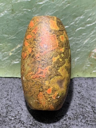 精美亚光高玉化草花纹战国红玛瑙手工雕刻道字桶珠一颗！ 精美亚光高玉化草花纹战国红玛瑙手工雕刻道字桶珠一颗！