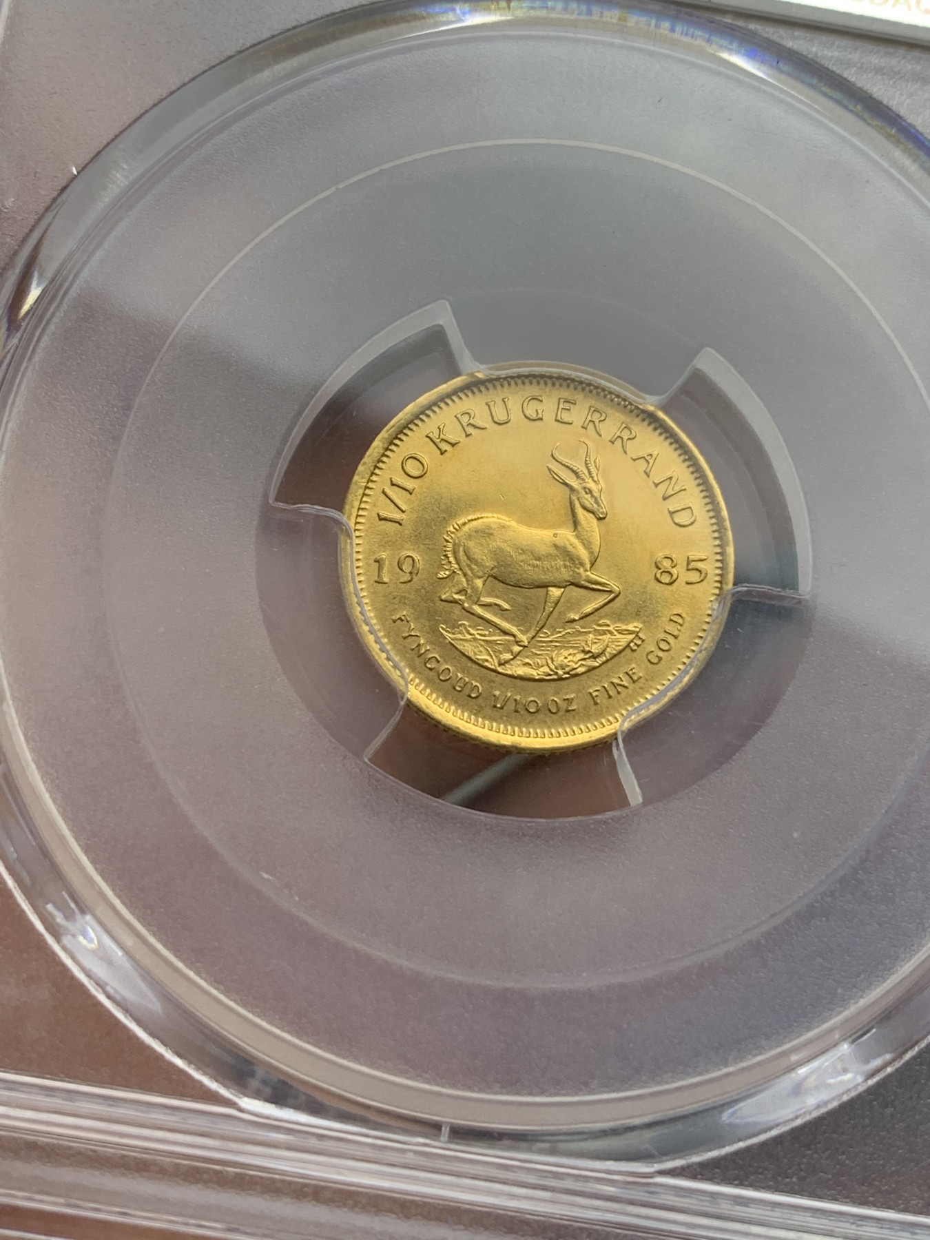 《竞宝斋》第179场-周日，周一2场 (全场包邮) PCGS-MS62 南非1985年1/10克鲁格金币，经典品种，光泽度高细节好，重3.39g,金价也要1500了