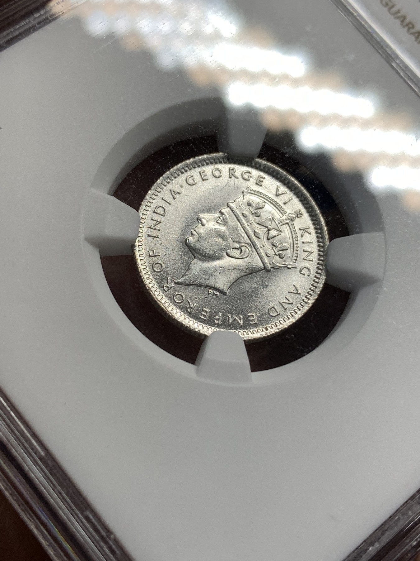 《竞宝斋》第179场-周日，周一2场 (全场包邮) NGC MS64+ 英属 马来亚 1943年乔六 10分银币 高分状态好