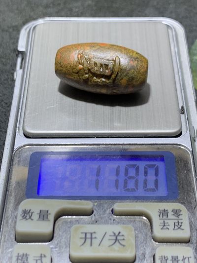 精美亚光高玉化草花纹战国红玛瑙手工雕刻道字桶珠一颗！ 精美亚光高玉化草花纹战国红玛瑙手工雕刻道字桶珠一颗！