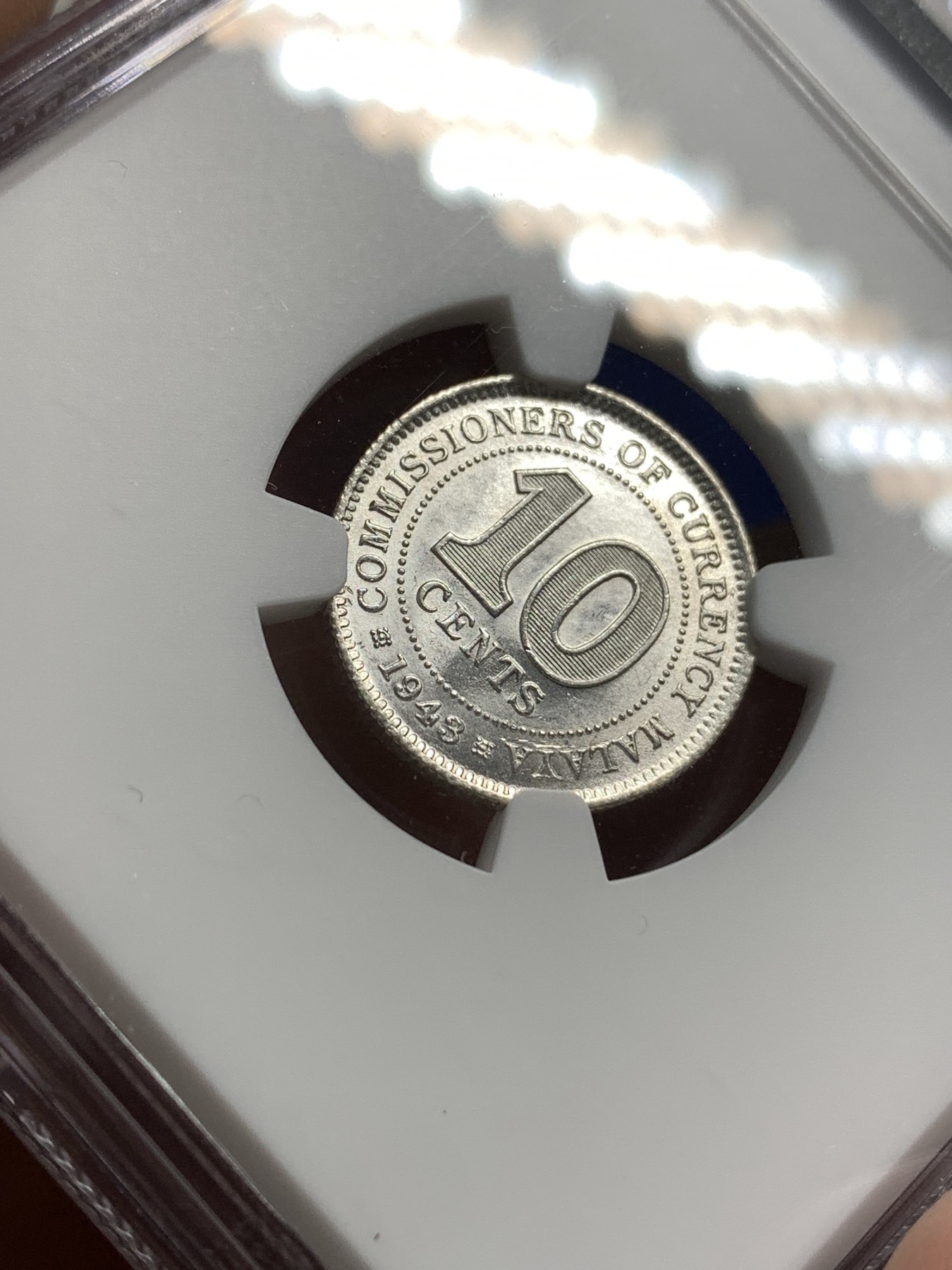 《竞宝斋》第179场-周日，周一2场 (全场包邮) NGC MS64+ 英属 马来亚 1943年乔六 10分银币 高分状态好