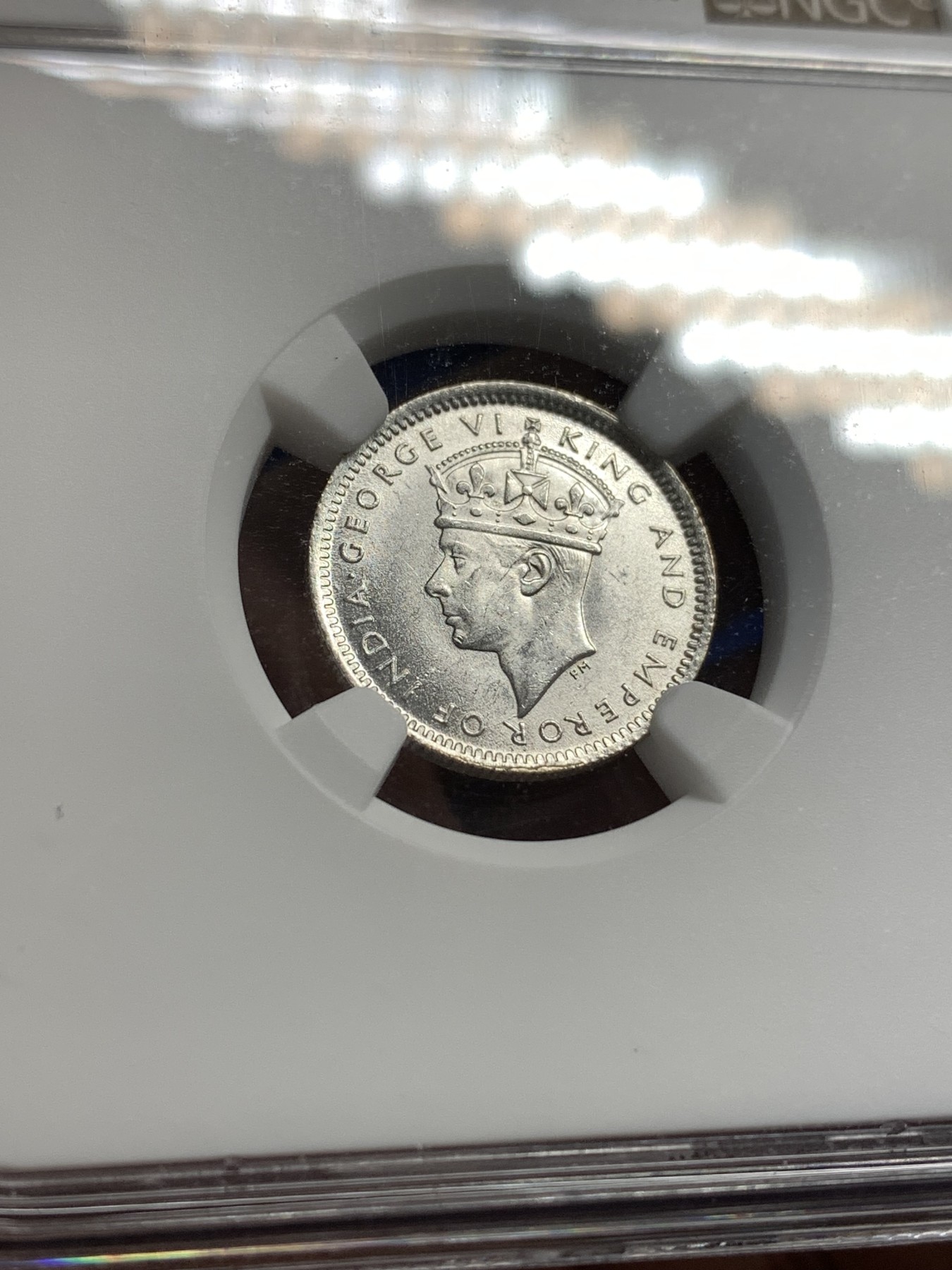 《竞宝斋》第179场-周日，周一2场 (全场包邮) NGC MS64+ 英属 马来亚 1943年乔六 10分银币 高分状态好