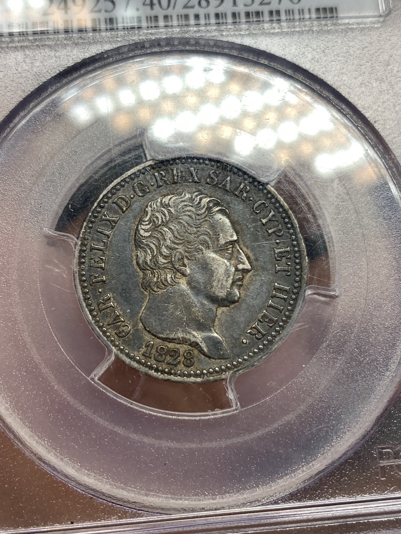 《竞宝斋》第179场-周日，周一2场 (全场包邮) 唯一冠军分 PCGS XF40 意大利 1828年 撒丁王国卡洛费利切1里拉 黑漆古包浆 小面值极少