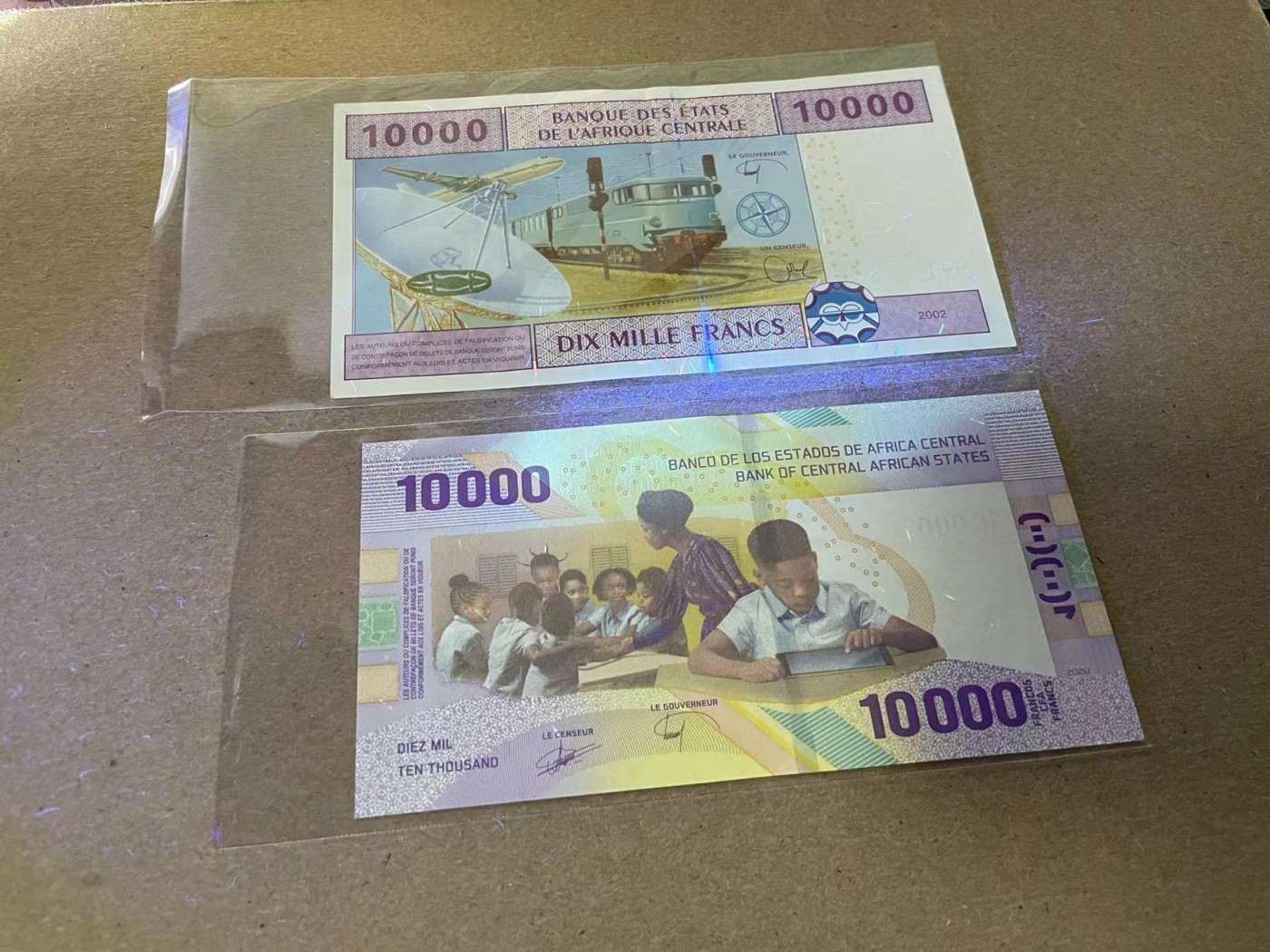 【Blue Auction】✨世界纸币精拍第341期——周日畅拍场 【一组2张】中非共同体 新版10000法郎 777豹子号 全新UNC&中非共同体2002年10000法郎AU品相