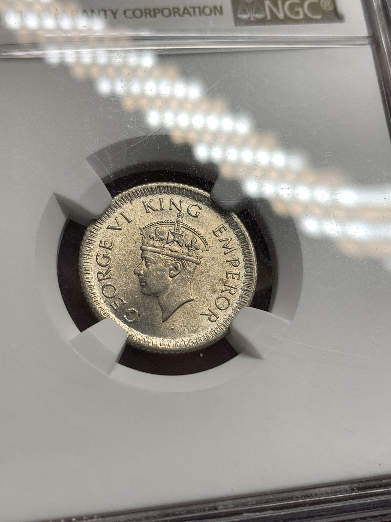 《竞宝斋》第179场-周日，周一2场 (全场包邮) NGC MS64 英属印度 乔六 1942年 1/4卢比银币 小面值少见