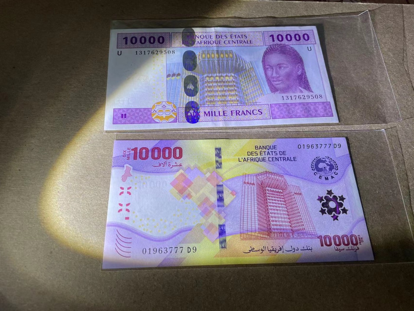 【Blue Auction】✨世界纸币精拍第341期——周日畅拍场 【一组2张】中非共同体 新版10000法郎 777豹子号 全新UNC&中非共同体2002年10000法郎AU品相