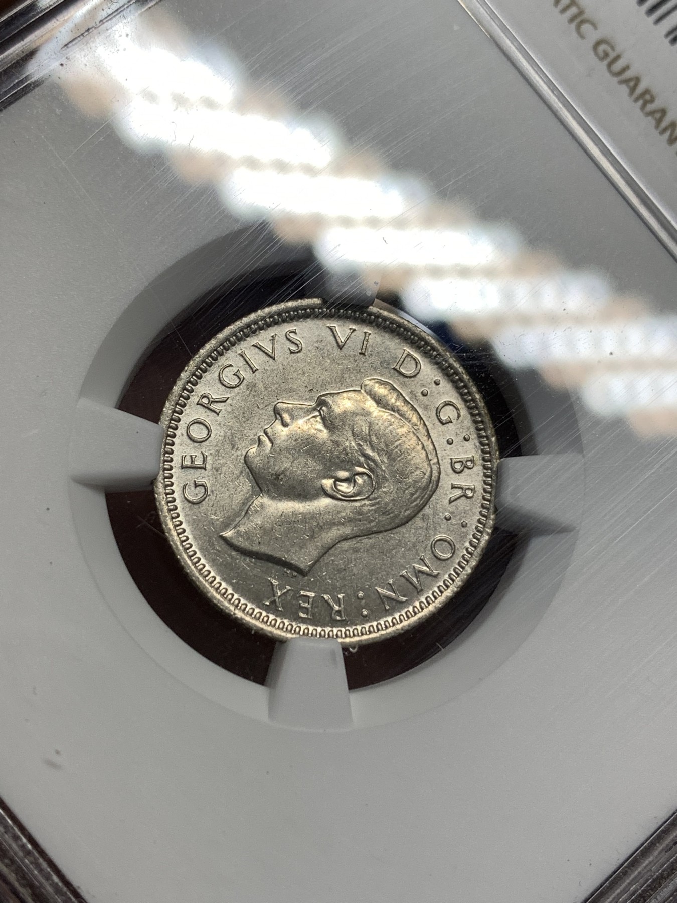 《竞宝斋》第179场-周日，周一2场 (全场包邮) NGC-MS61 英国1943年 乔六6便士银币 原光好品