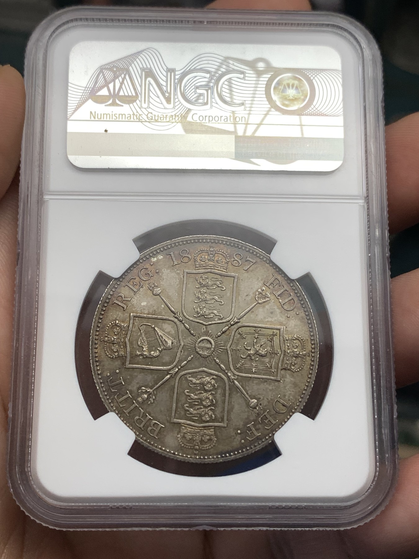 《竞宝斋》第179场-周日，周一2场 (全场包邮) NGC MS65 英国1887年 维多利亚女王高冠版 双福林银币 高等级分数 双面五彩包浆非常难得