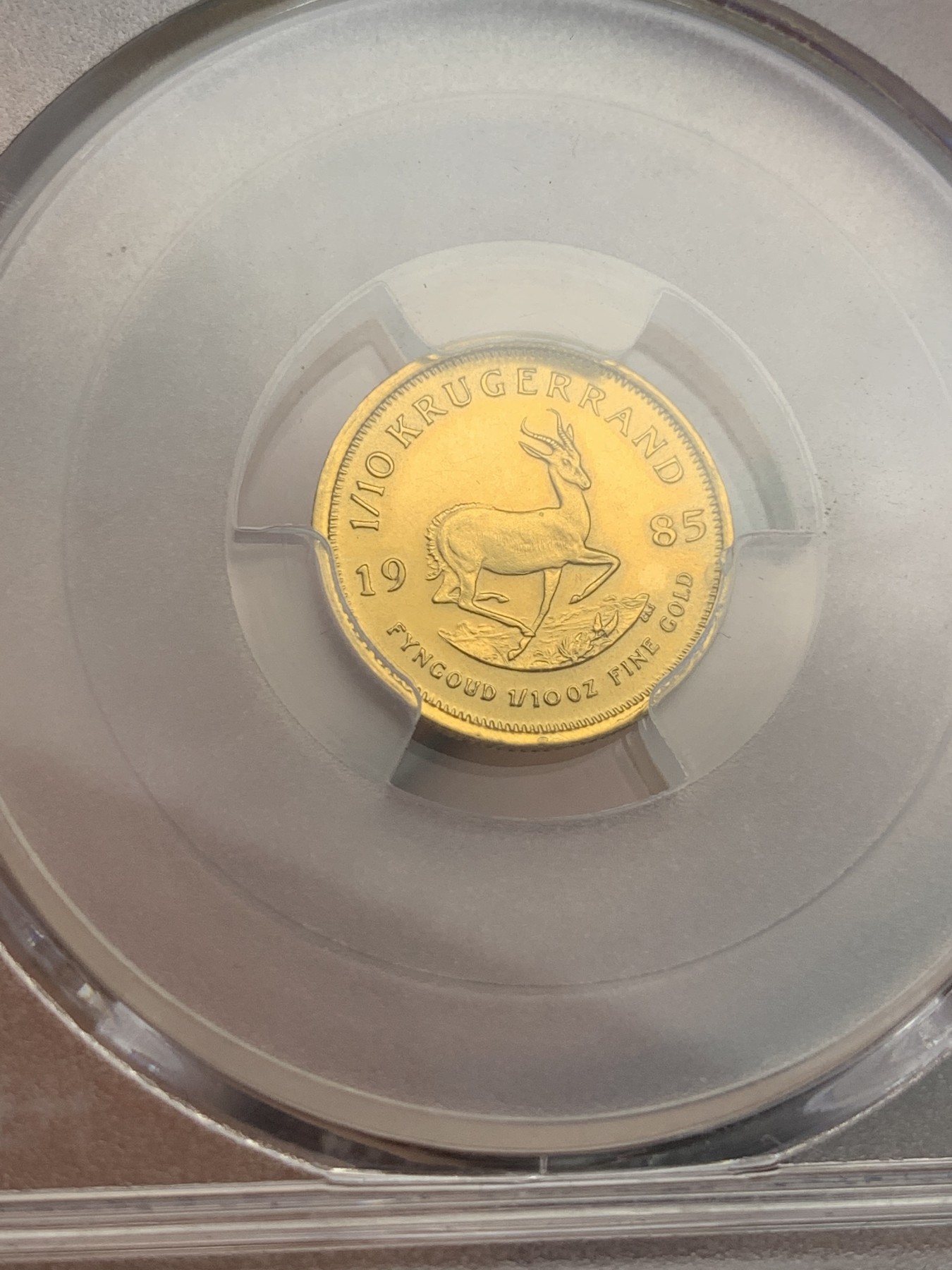 《竞宝斋》第179场-周日，周一2场 (全场包邮) PCGS-MS62 南非1985年1/10克鲁格金币，经典品种，光泽度高细节好，重3.39g,金价也要1500了