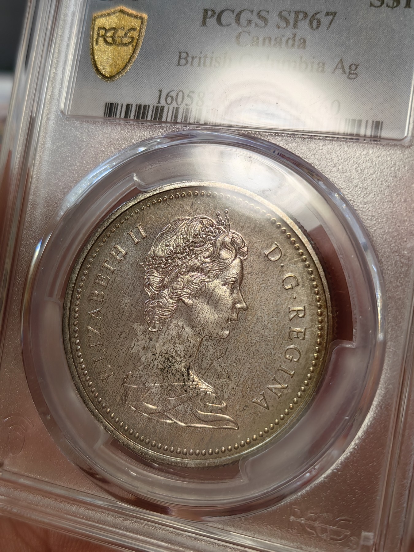 橡树集藏-006场 海纳百川 pcgs-sp67 1971年加拿大伊丽莎白银样币 哥伦比亚百年 盾徽面彩虹炫彩 实物绝美