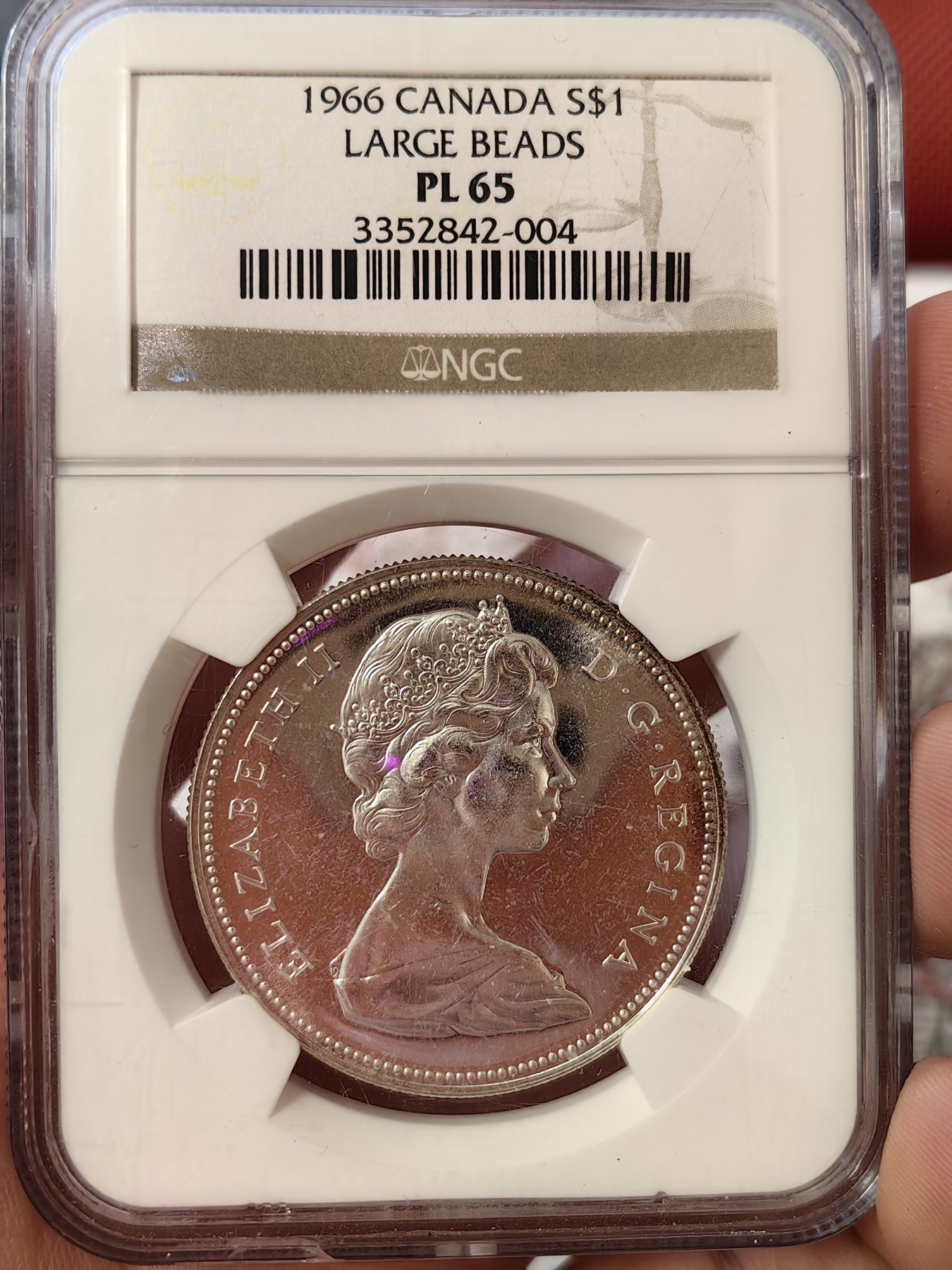 橡树集藏-006场 海纳百川 ngc-pl65 1966年加拿大划船1美元大银币 类精制工艺 光泽四溢 大圆珠版本 中年伊伊头像 端庄典雅