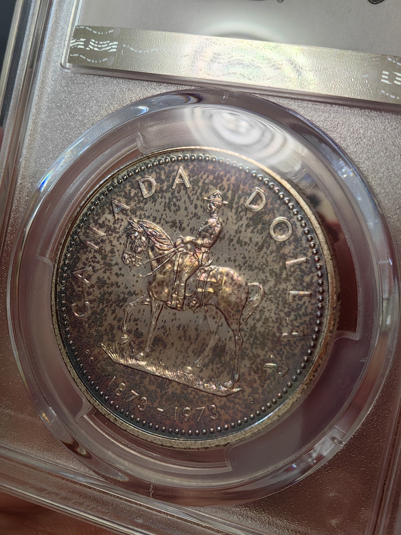 橡树集藏-006场 海纳百川 pcgs-sp67 1973年加拿大伊丽莎白银样币 骑警百年纪念银币 背面彩虹炫彩