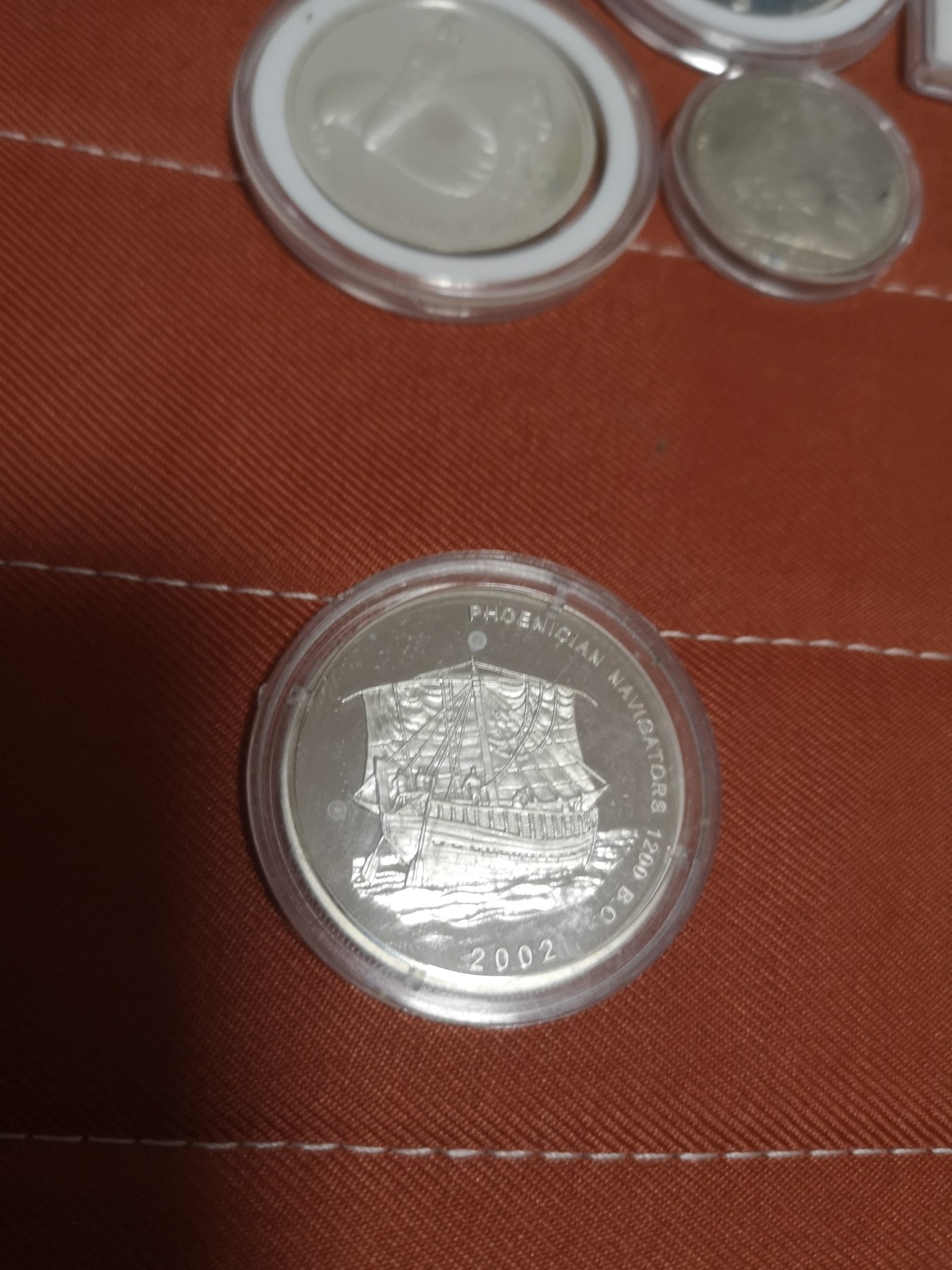 长老汇第14场精品新老银币系列 2002加纳臆造币--腓尼基人航海500sika精制银币，不常见
