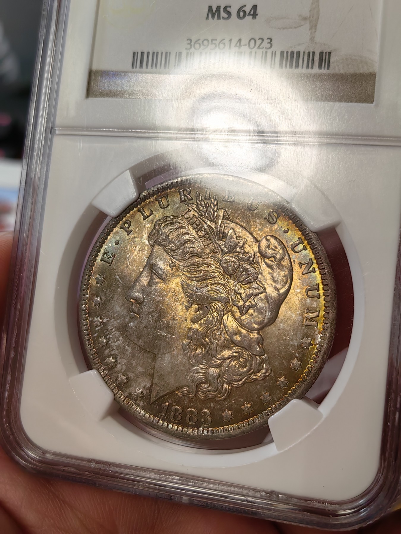 橡树集藏-006场 海纳百川 ngc-ms64 1883年o版美国摩根银元 老盒严评 正面炫目全金彩 洋红色点缀 实物观感极佳