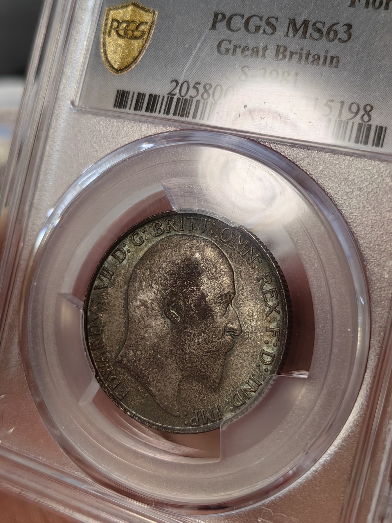橡树集藏-006场 海纳百川 PCGS-MS63 英国1902年爱德华七世 海神Florin 银币，出众的设计不列塔尼女神在海岸边迎风傲立，守护日不落帝国疆域。这枚钱币包浆醇厚，打制尚佳，值得入手。