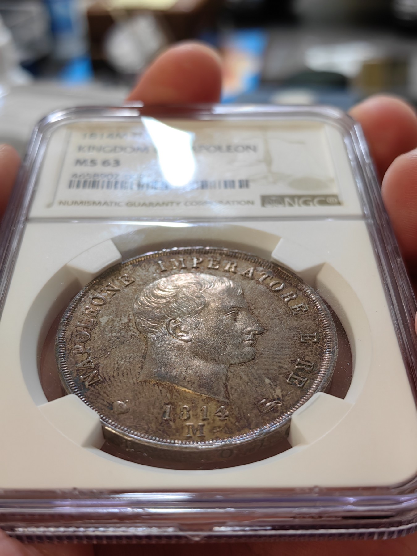 橡树集藏-006场 海纳百川 NGC-MS63 1814年意大利王国拿破仑5里拉大银币，万中无一的赤霞艳彩间中还有碧蓝点缀，背面帝国鹰徽加上类镜面底板霸气尽显。一代雄主，顶级设计。实物绝美，法系人不可错过的拿皇大银。