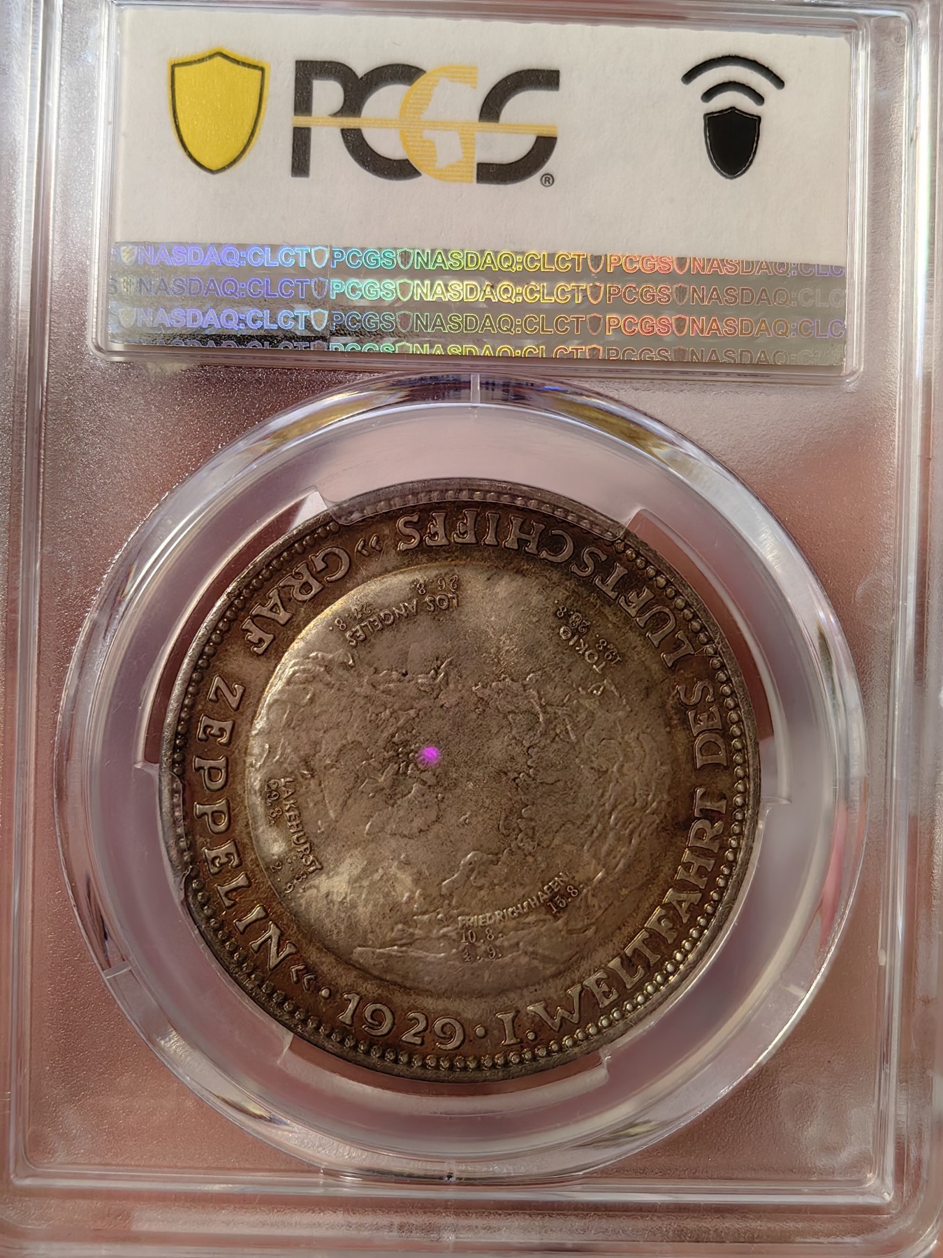 橡树集藏-006场 海纳百川 pcgs-sp66 (Kaiser-511、加字版),魏玛共和国1929，齐拍林飞艇环游世界纪念银章，顶级高分，五彩镜面，背面为标注“洛杉矶”“东京”等地名的高浮雕地球图案。