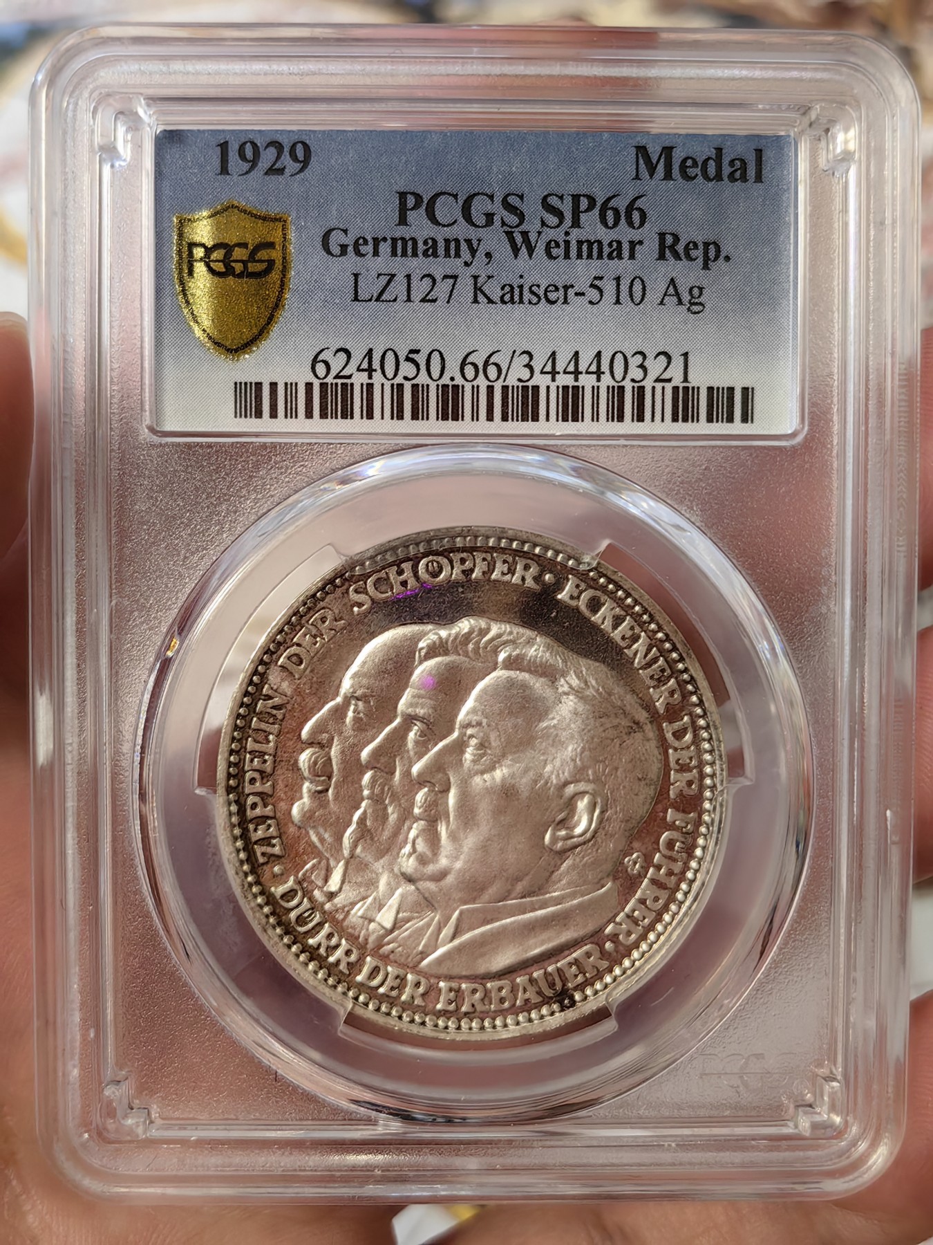 橡树集藏-006场 海纳百川 pcgs-sp66 1929年 (Kaiser-510),齐拍林飞艇环游世界，顶级高分，镜面底板，背面为标注“洛杉矶”“东京”等地名的高浮雕地球图案。