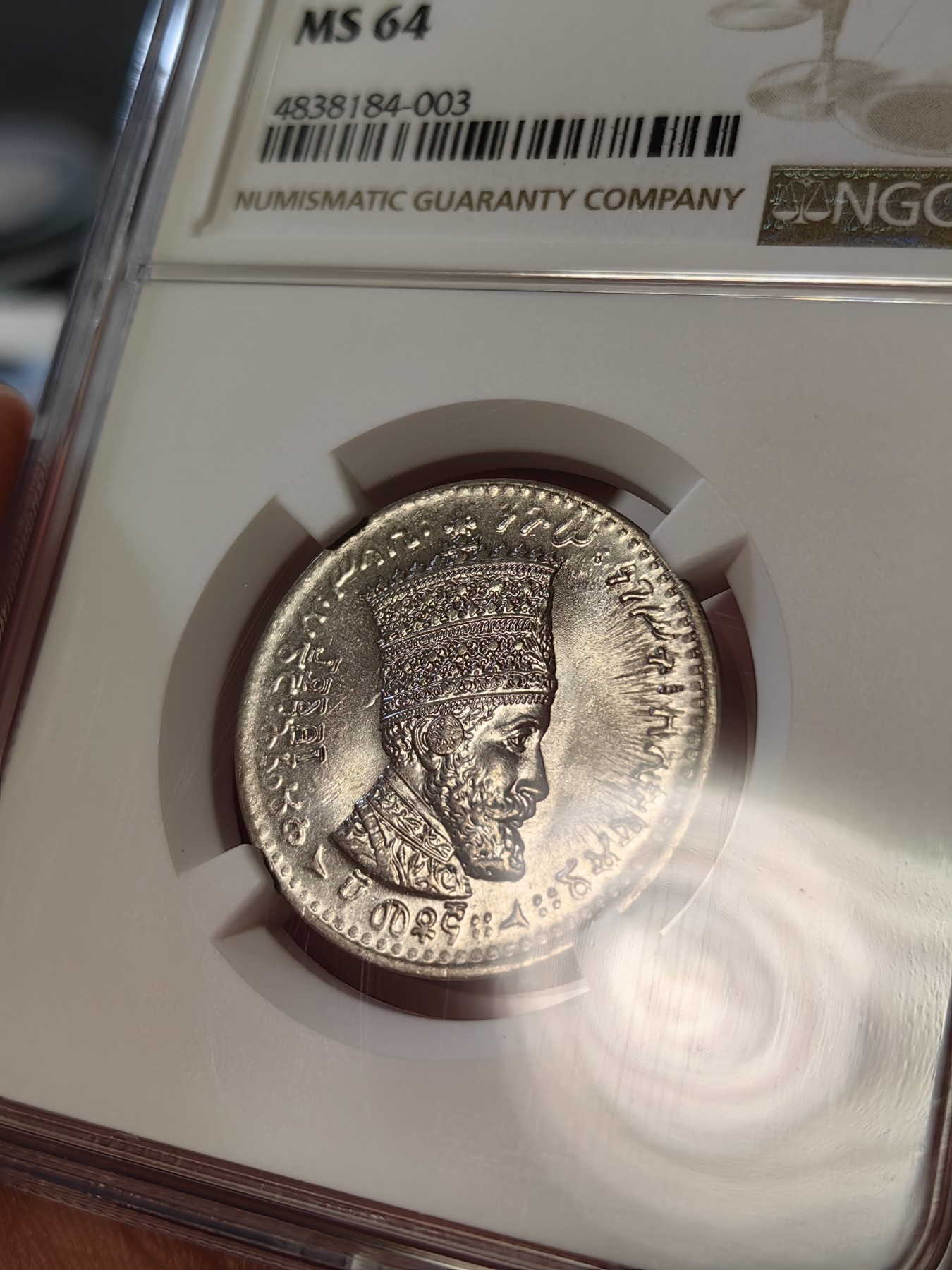 橡树集藏-006场 海纳百川 ngc-Ms64 1931年埃塞俄比亚50马托雅思 只发行了一年 高分好状态 正面是头戴王冠的大胡子非洲国王 细节极佳 背面是右扛旗雄狮 大热门银币同种设计 稀有品种 亚军分 上面只有一枚更高分