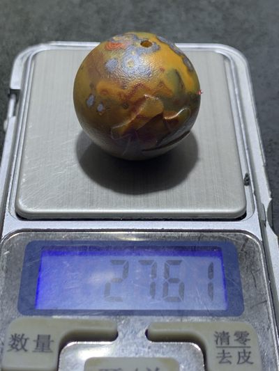 精美亚光战国红玛瑙手工雕刻仁字大圆珠一颗！ 精美亚光战国红玛瑙手工雕刻仁字大圆珠一颗！