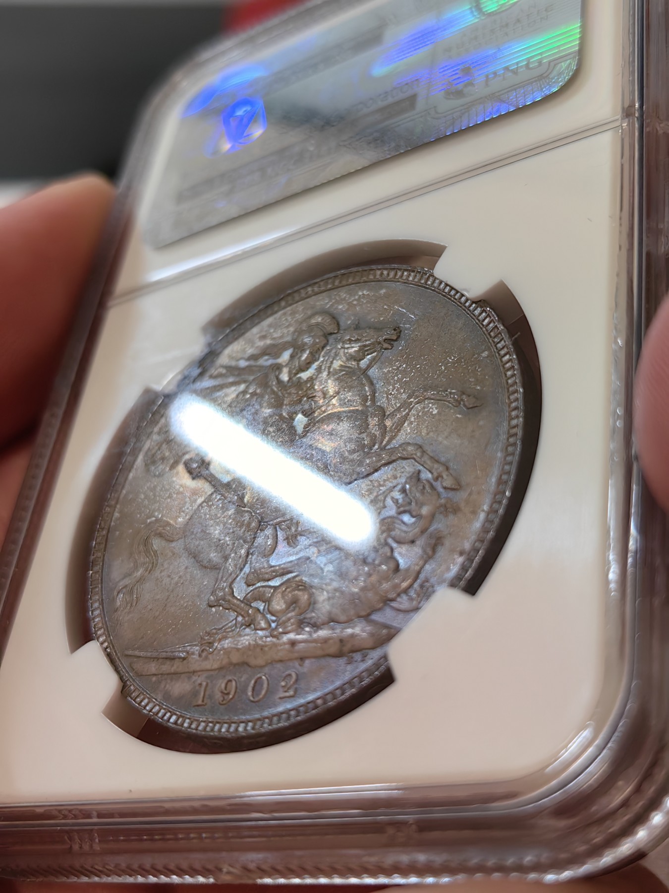 橡树集藏-006场 海纳百川 ngc-MS63 1902年爱七马剑 磨砂质老包浆，正面环彩，背面老包浆，MS63以上高分不多，品相到位的藏品