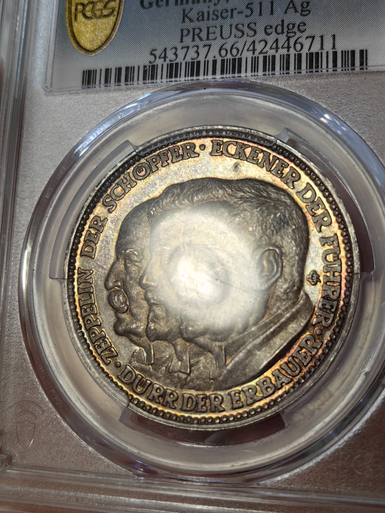 橡树集藏-006场 海纳百川 pcgs-sp66 (Kaiser-511、加字版),魏玛共和国1929，齐拍林飞艇环游世界纪念银章，顶级高分，五彩镜面，背面为标注“洛杉矶”“东京”等地名的高浮雕地球图案。