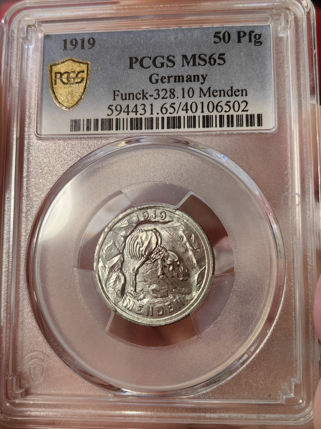 橡树集藏-006场 海纳百川 pcgs-Ms65，德国紧急状态时期50芬尼铁币，数据库唯一记录，冠军分顶级品。大名誉品种。双面1919，极为罕见的铁质洞熊，打制深骏，状态极佳。背面pl感强烈，小镜子。铁币能有此工艺极为难得。 双面1919是洞熊这个品种的大珍，发行量只有150枚左右。此枚市面仅见，可遇不可求～