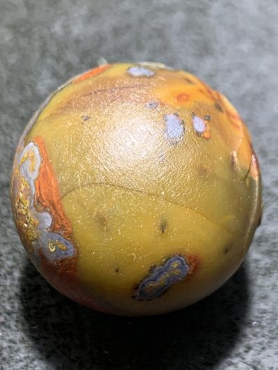 精美亚光战国红玛瑙手工雕刻仁字大圆珠一颗！ 精美亚光战国红玛瑙手工雕刻仁字大圆珠一颗！