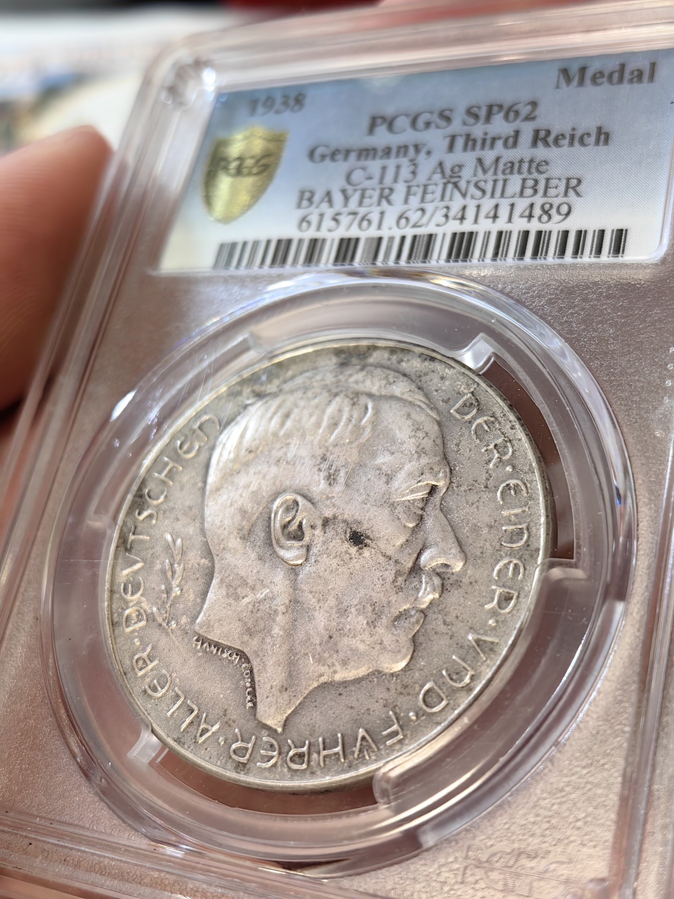橡树集藏-006场 海纳百川 pcgs-sp62 1938年德国入侵吞并奥地利纪念银章！ 元首名誉品种！数量极少！ 德军在元首的命令下，通过元首家乡的大桥，占领奥地利。非常有象征意义的军事行动。德奥合并，德意志重归一统，第三帝国自此诞生。