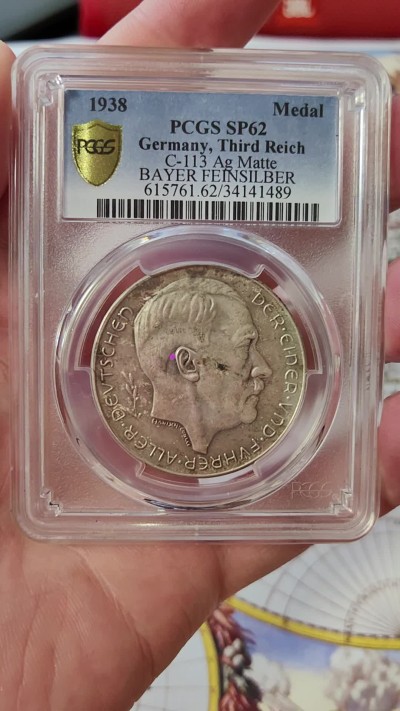 橡树集藏-006场 海纳百川 pcgs-sp62 1938年德国入侵吞并奥地利纪念银章！ 元首名誉品种！数量极少！ 德军在元首的命令下，通过元首家乡的大桥，占领奥地利。非常有象征意义的军事行动。德奥合并，德意志重归一统，第三帝国自此诞生。