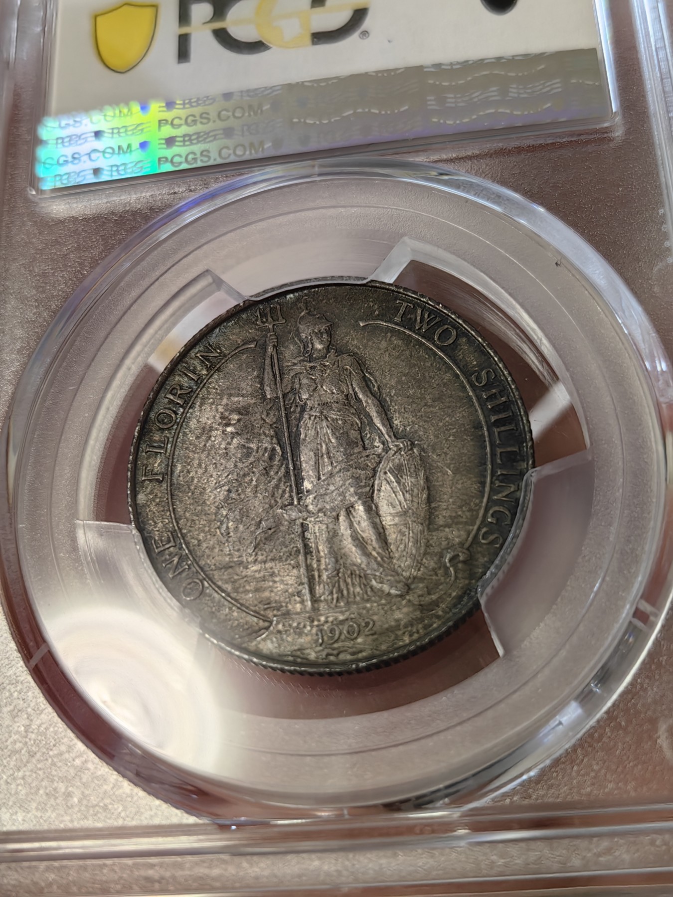 橡树集藏-006场 海纳百川 PCGS-MS63 英国1902年爱德华七世 海神Florin 银币，出众的设计不列塔尼女神在海岸边迎风傲立，守护日不落帝国疆域。这枚钱币包浆醇厚，打制尚佳，值得入手。