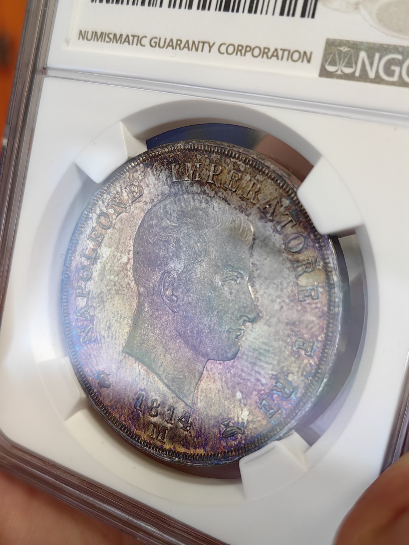 橡树集藏-006场 海纳百川 NGC-MS63 1814年意大利王国拿破仑5里拉大银币，万中无一的赤霞艳彩间中还有碧蓝点缀，背面帝国鹰徽加上类镜面底板霸气尽显。一代雄主，顶级设计。实物绝美，法系人不可错过的拿皇大银。