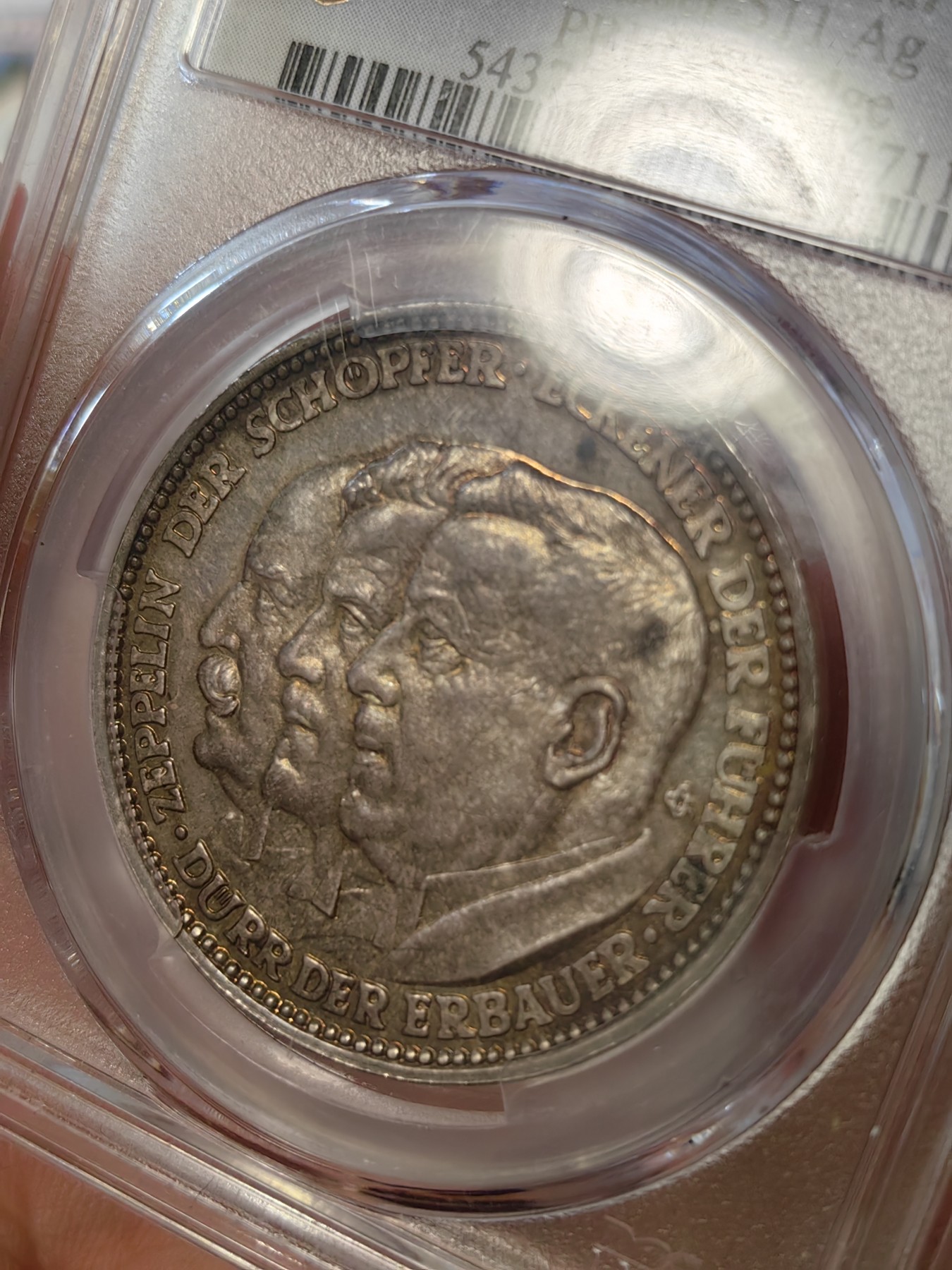 橡树集藏-006场 海纳百川 pcgs-sp66 (Kaiser-511、加字版),魏玛共和国1929，齐拍林飞艇环游世界纪念银章，顶级高分，五彩镜面，背面为标注“洛杉矶”“东京”等地名的高浮雕地球图案。