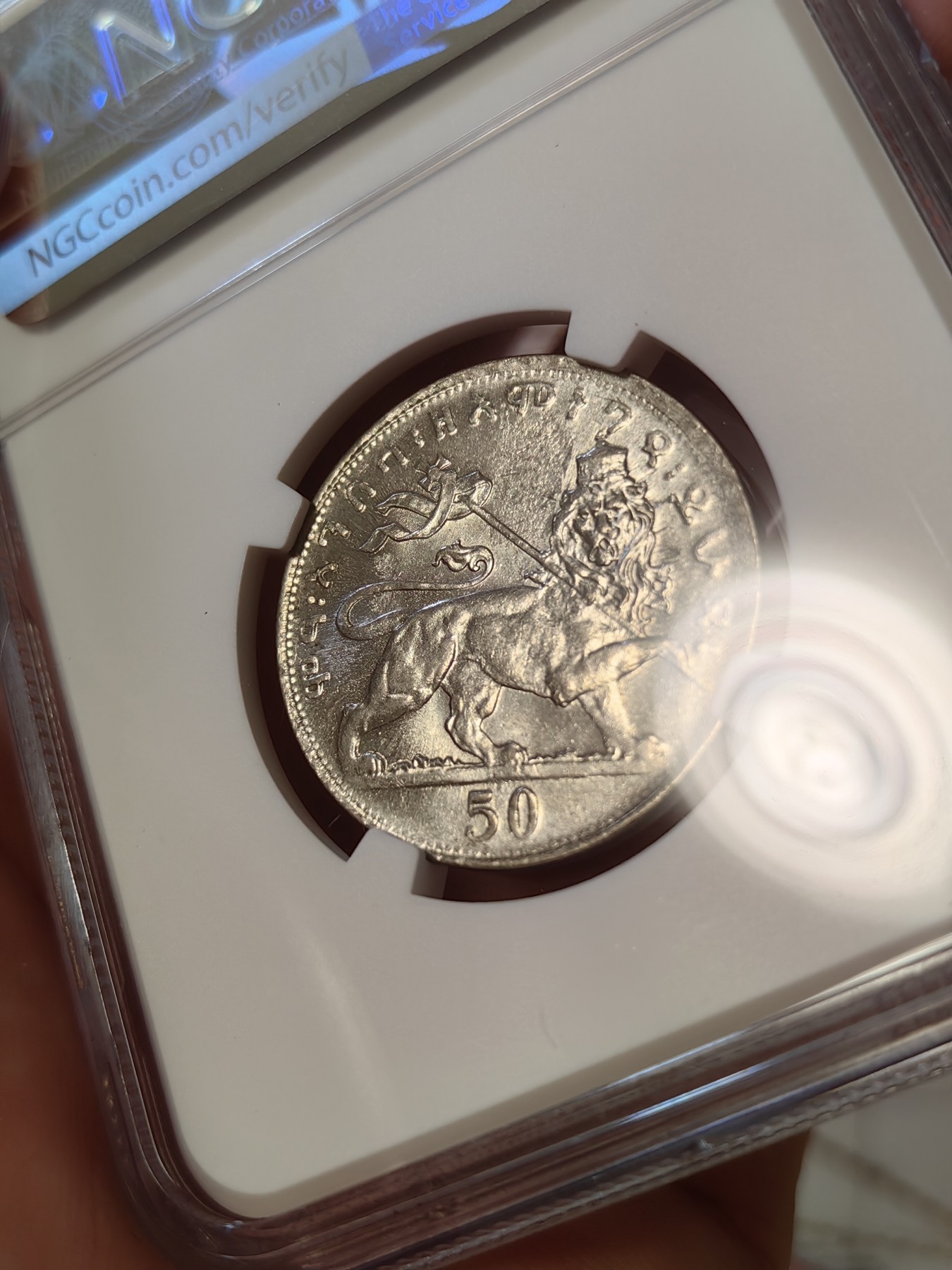 橡树集藏-006场 海纳百川 ngc-Ms64 1931年埃塞俄比亚50马托雅思 只发行了一年 高分好状态 正面是头戴王冠的大胡子非洲国王 细节极佳 背面是右扛旗雄狮 大热门银币同种设计 稀有品种 亚军分 上面只有一枚更高分