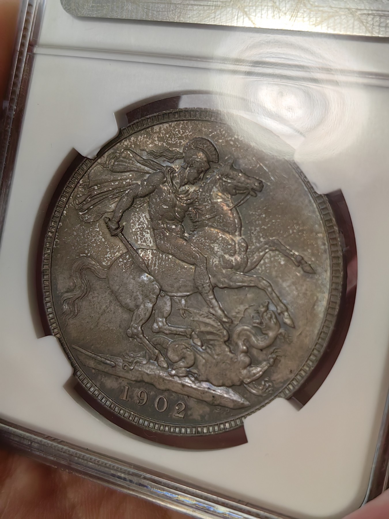 橡树集藏-006场 海纳百川 ngc-MS63 1902年爱七马剑 磨砂质老包浆，正面环彩，背面老包浆，MS63以上高分不多，品相到位的藏品