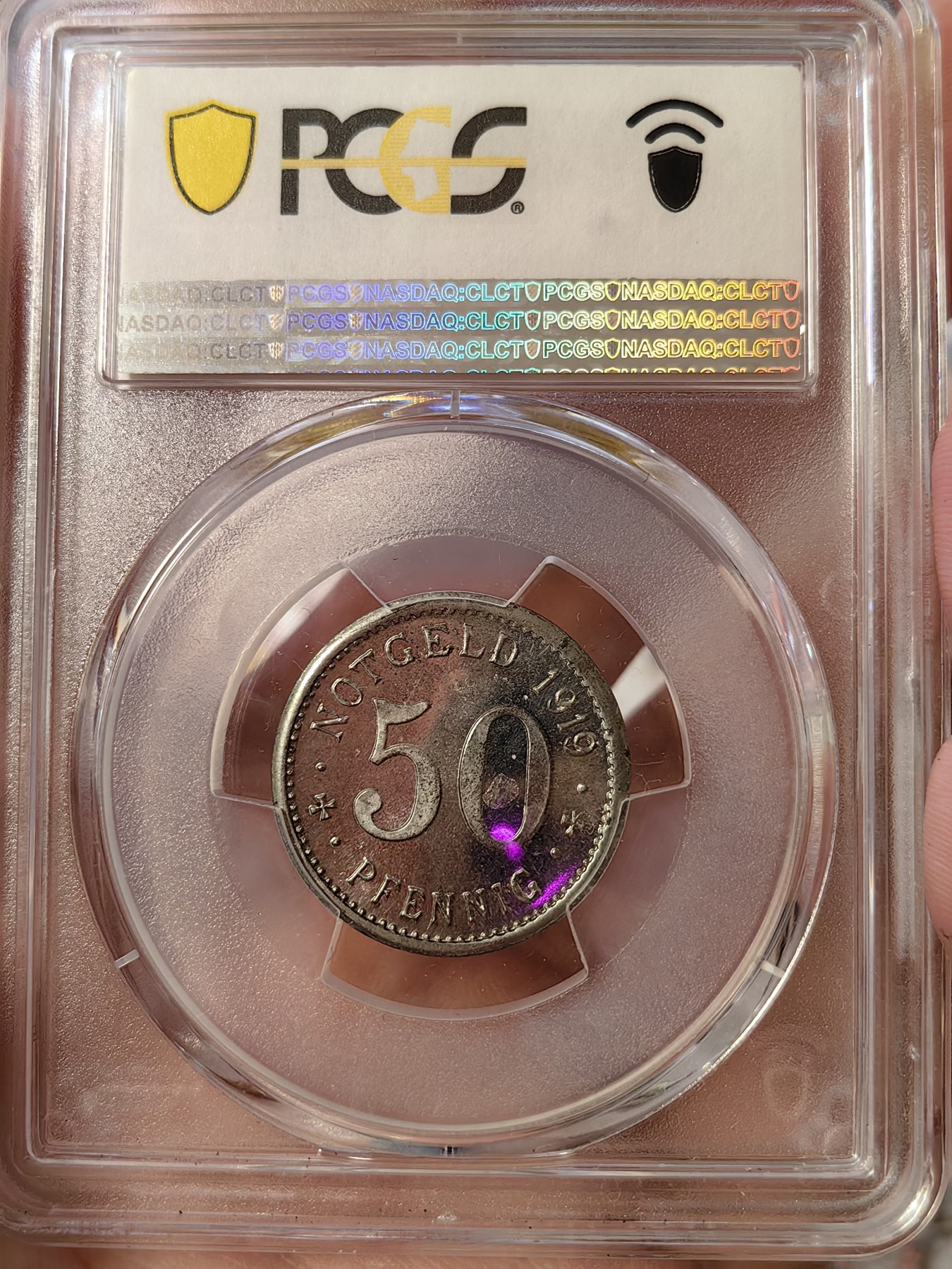 橡树集藏-006场 海纳百川 pcgs-Ms65，德国紧急状态时期50芬尼铁币，数据库唯一记录，冠军分顶级品。大名誉品种。双面1919，极为罕见的铁质洞熊，打制深骏，状态极佳。背面pl感强烈，小镜子。铁币能有此工艺极为难得。 双面1919是洞熊这个品种的大珍，发行量只有150枚左右。此枚市面仅见，可遇不可求～