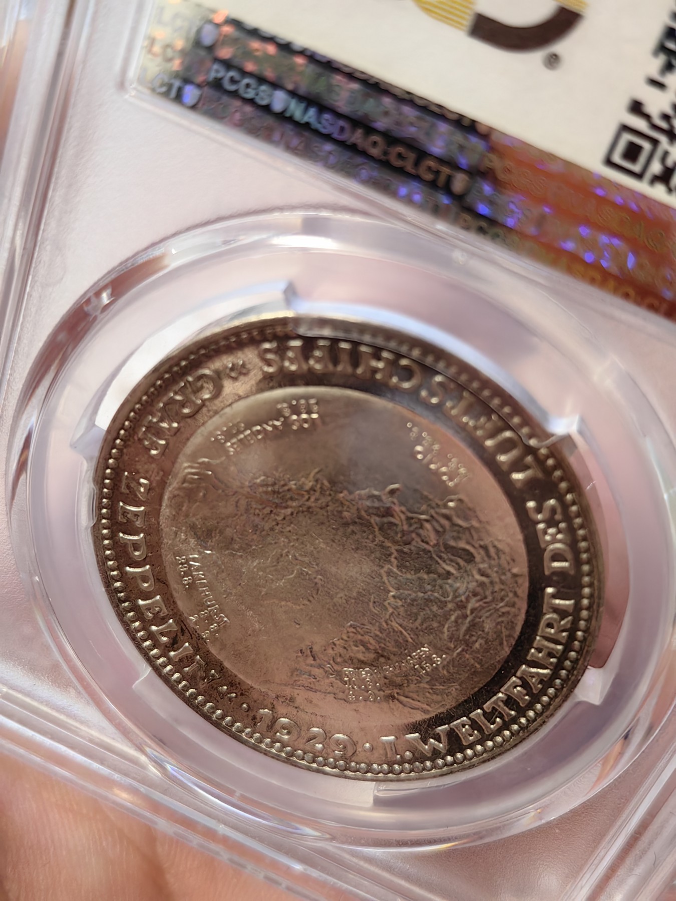 橡树集藏-006场 海纳百川 pcgs-sp66 1929年 (Kaiser-510),齐拍林飞艇环游世界，顶级高分，镜面底板，背面为标注“洛杉矶”“东京”等地名的高浮雕地球图案。