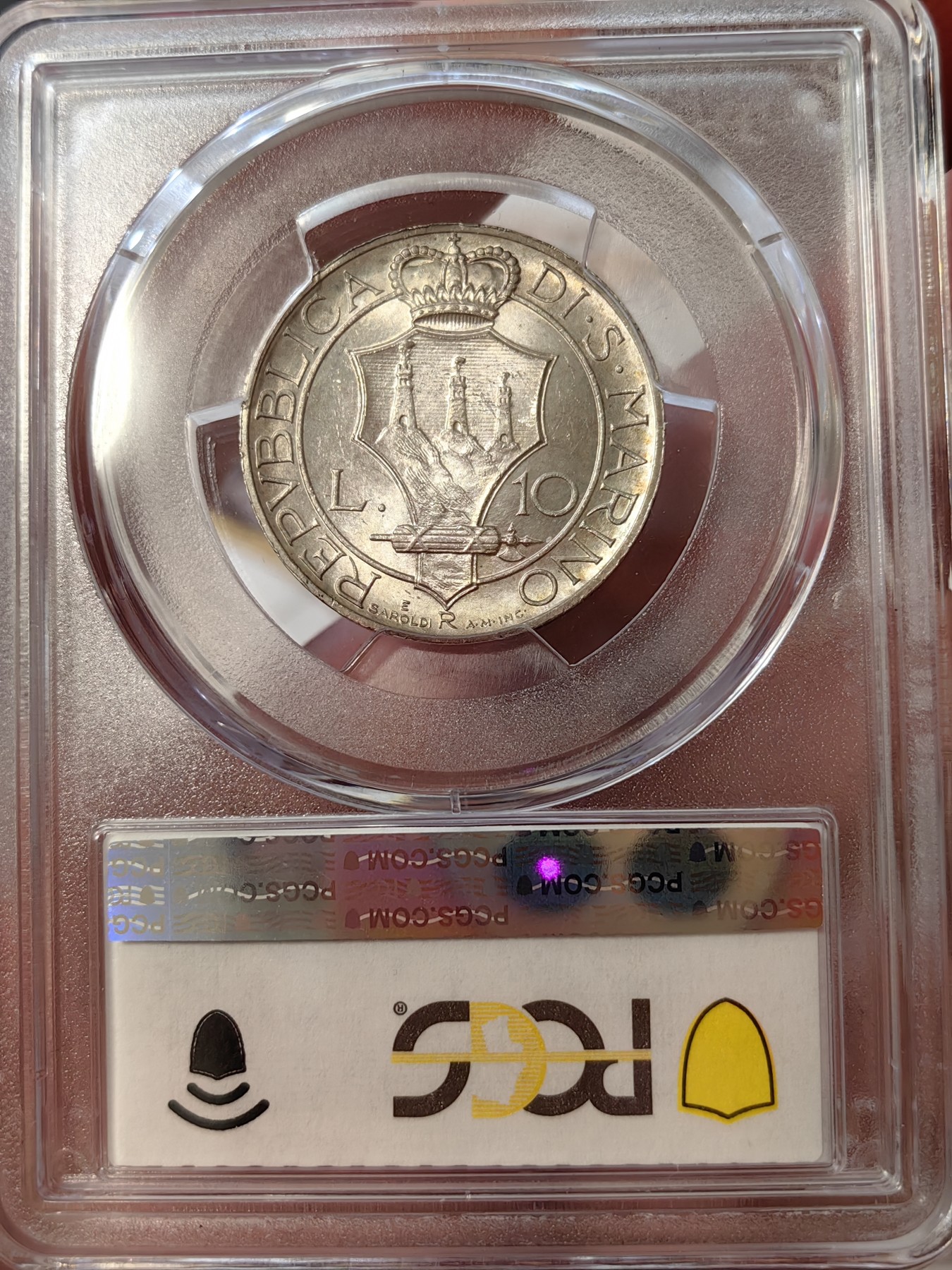 橡树集藏-006场 海纳百川 pcgs-ms64 1937年圣马力诺10里拉银币 持剑圣女手托皇冠，英姿飒爽，打制压印十足，黄油包浆转光美丽，赏心悦目。热门女神题材，不可多得。