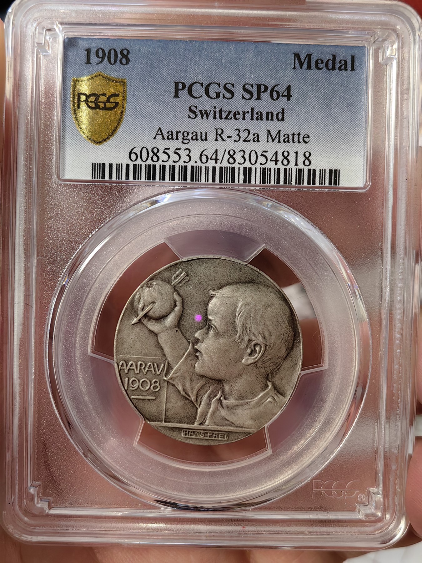 橡树集藏-006场 海纳百川 PCGS-sp64 1908年瑞士阿尔高州阿劳射击节 正面：风格化的鹰面向左，右爪握着阿尔高之盾；背面：威廉泰尔的小儿子，面向左侧，高举着被箭刺穿的苹果。新兴现代主义风格的迷人奖章。在里克特书中被列为“稀有”。铸造量仅293枚。