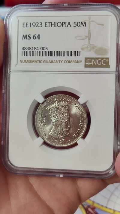 橡树集藏-006场 海纳百川 ngc-Ms64 1931年埃塞俄比亚50马托雅思 只发行了一年 高分好状态 正面是头戴王冠的大胡子非洲国王 细节极佳 背面是右扛旗雄狮 大热门银币同种设计 稀有品种 亚军分 上面只有一枚更高分