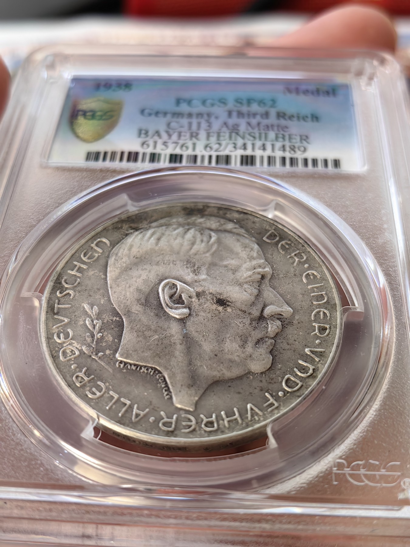 橡树集藏-006场 海纳百川 pcgs-sp62 1938年德国入侵吞并奥地利纪念银章！ 元首名誉品种！数量极少！ 德军在元首的命令下，通过元首家乡的大桥，占领奥地利。非常有象征意义的军事行动。德奥合并，德意志重归一统，第三帝国自此诞生。