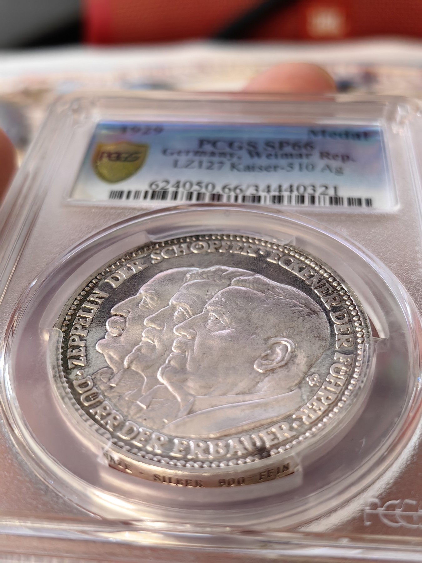 橡树集藏-006场 海纳百川 pcgs-sp66 1929年 (Kaiser-510),齐拍林飞艇环游世界，顶级高分，镜面底板，背面为标注“洛杉矶”“东京”等地名的高浮雕地球图案。