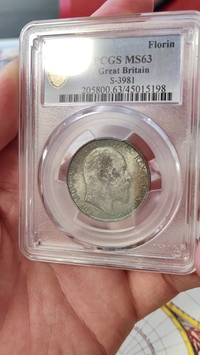 橡树集藏-006场 海纳百川 PCGS-MS63 英国1902年爱德华七世 海神Florin 银币，出众的设计不列塔尼女神在海岸边迎风傲立，守护日不落帝国疆域。这枚钱币包浆醇厚，打制尚佳，值得入手。
