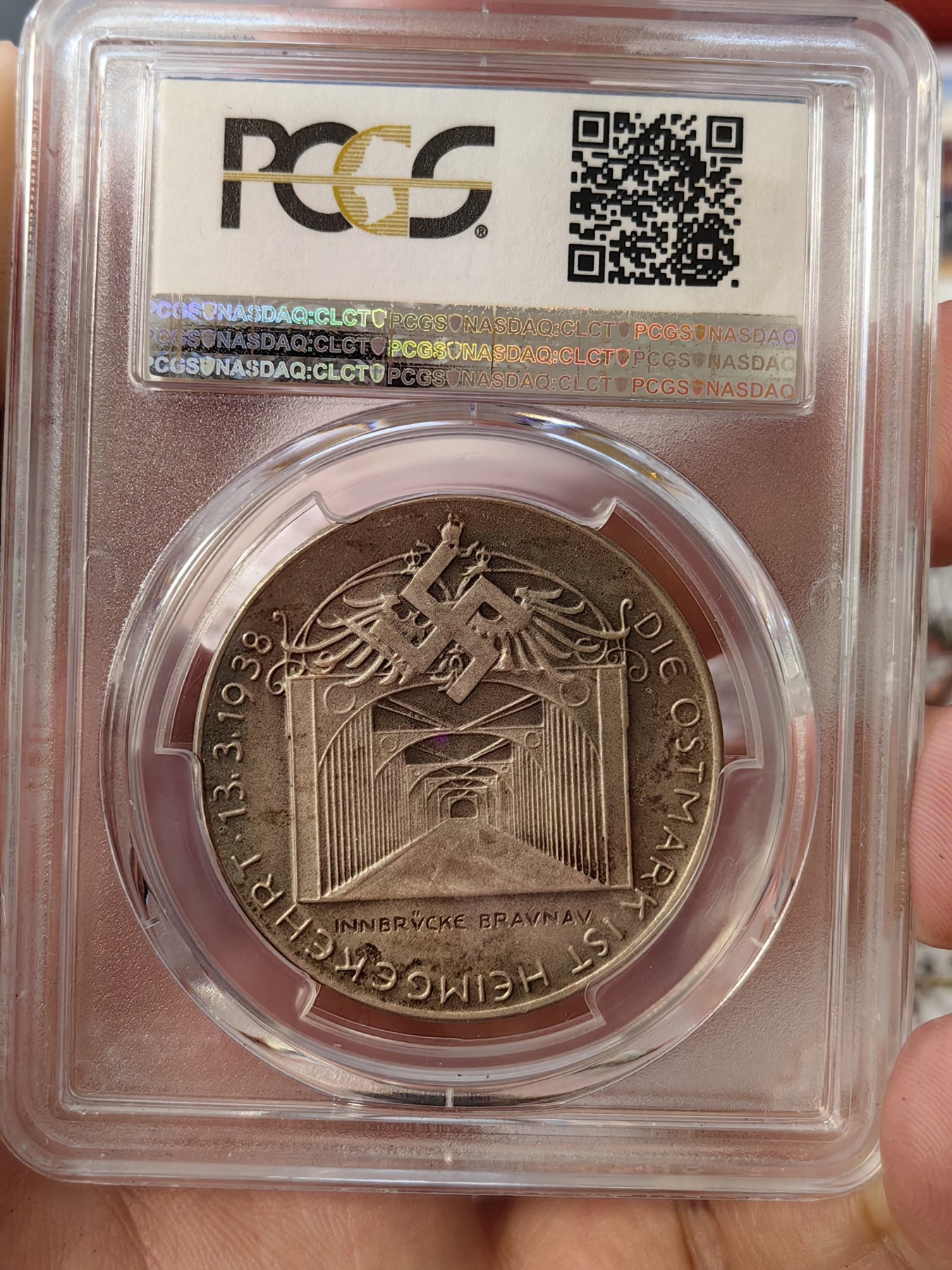 橡树集藏-006场 海纳百川 pcgs-sp62 1938年德国入侵吞并奥地利纪念银章！ 元首名誉品种！数量极少！ 德军在元首的命令下，通过元首家乡的大桥，占领奥地利。非常有象征意义的军事行动。德奥合并，德意志重归一统，第三帝国自此诞生。