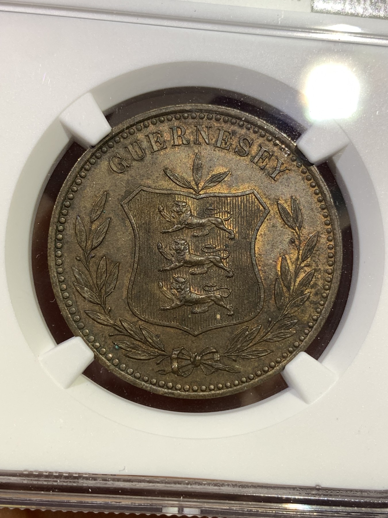 《竞宝斋》第180场-周日，周一2场 (全场包邮) NGC-UNC 1885H 英属根西8道布大铜币，细节极佳，三狮面部清晰可辨，殊为难得。上海NGC严评。